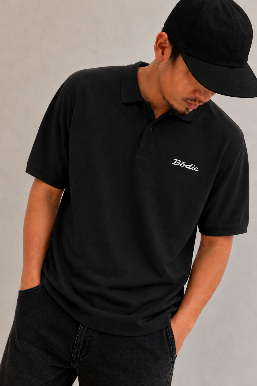 Bōdie Embroidered polo shirt. Black.