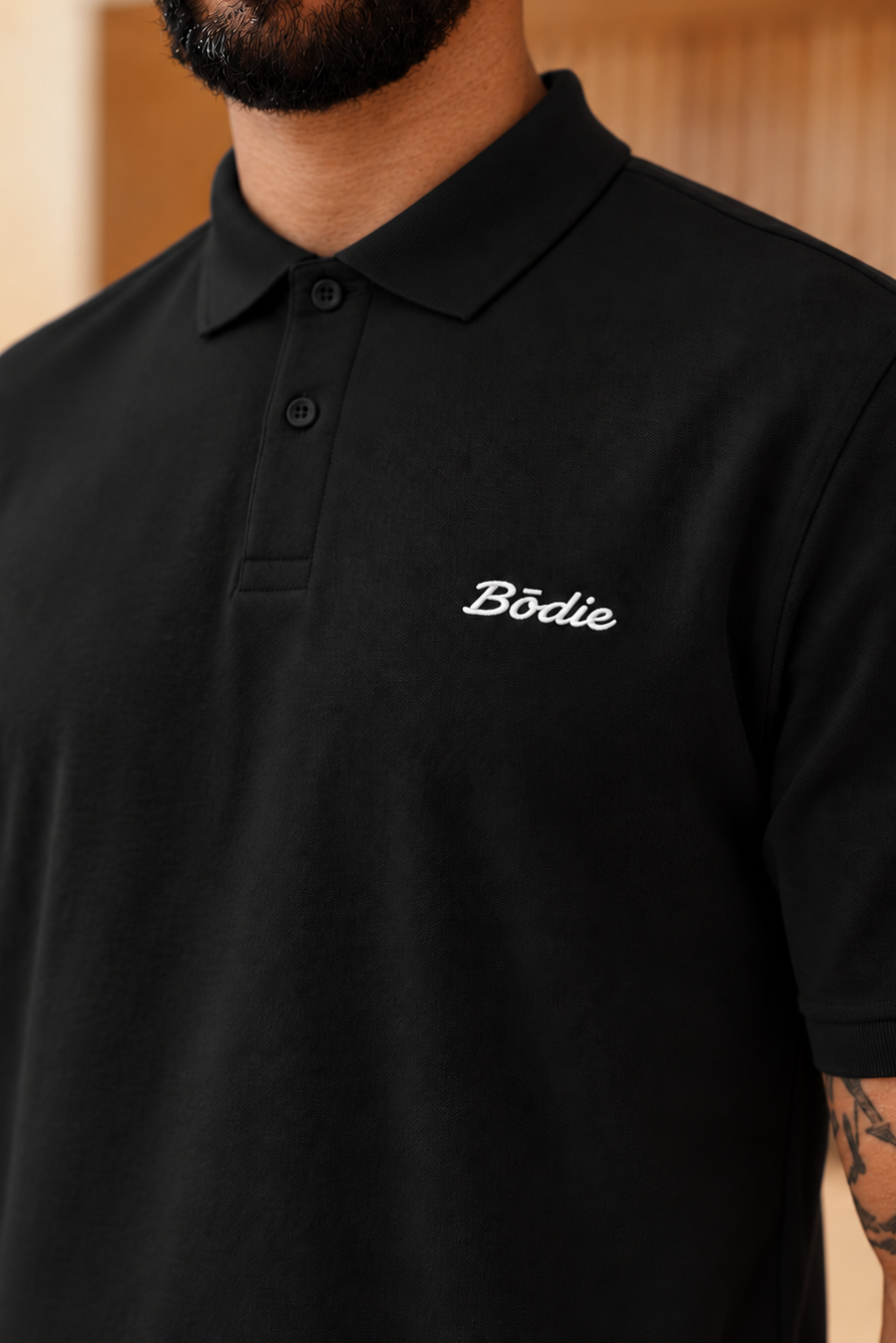 Bōdie Embroidered polo shirt. Black.