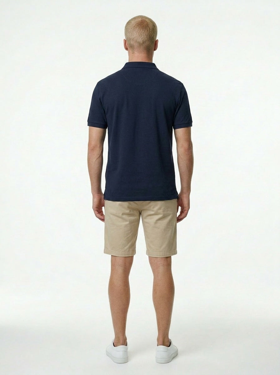 Bōdie Embroidered polo shirt. Navy Blue.