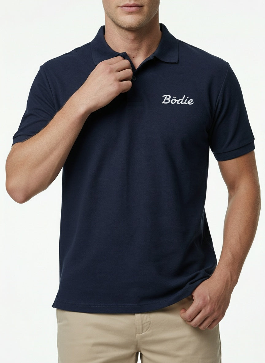 Bōdie Embroidered polo shirt. Navy Blue.