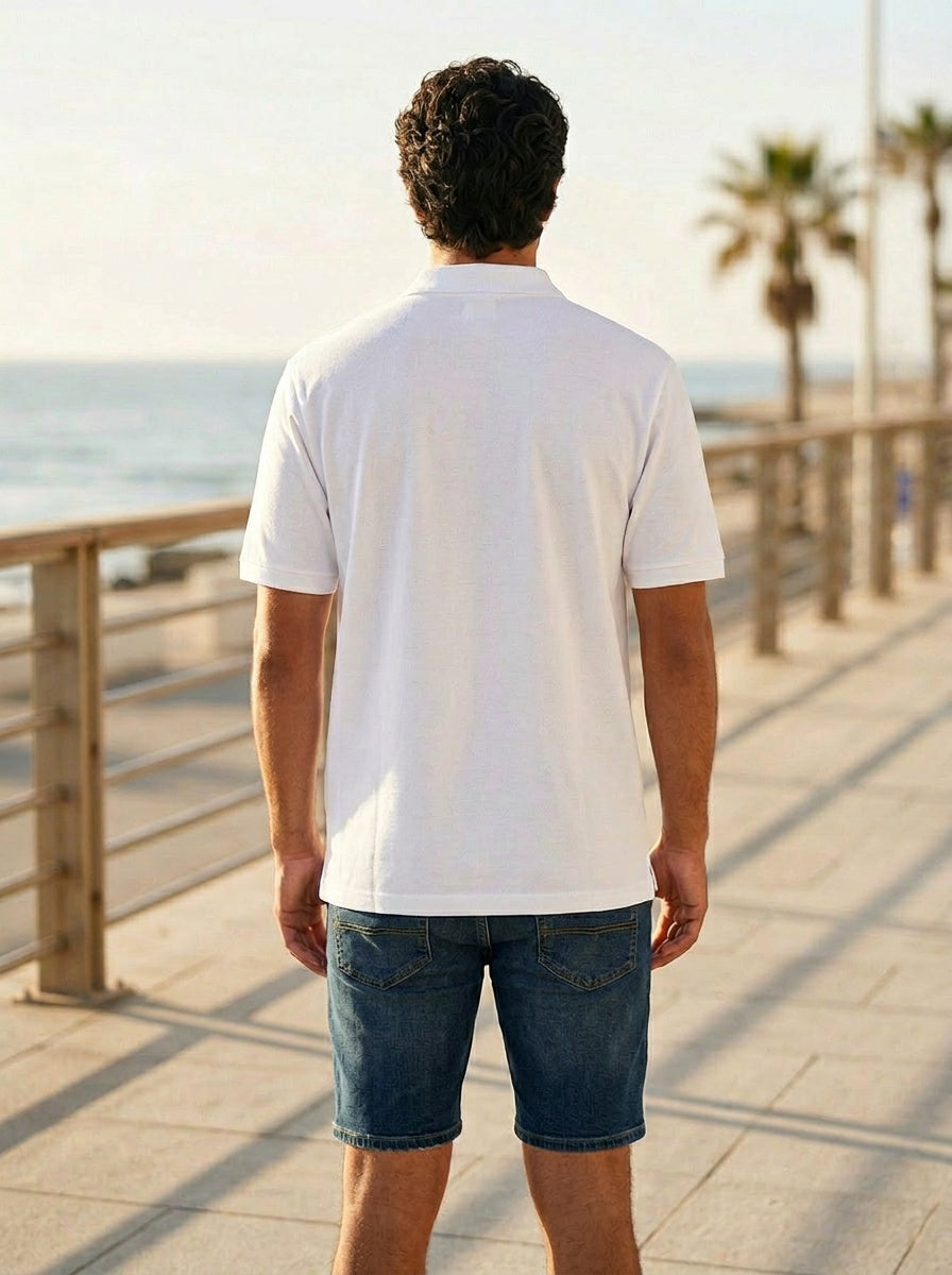 Bōdie Logo embroidered polo shirt. White.